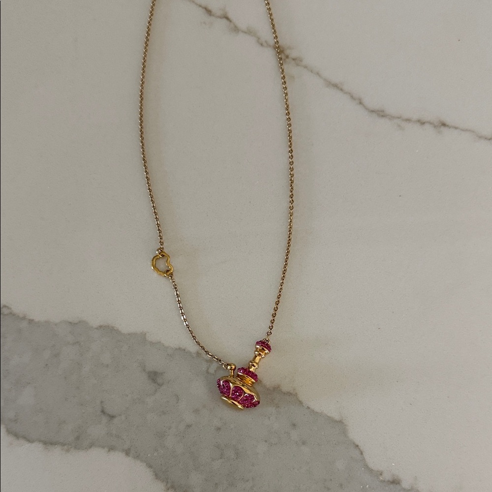 Swarovski Alice in wonderland necklace